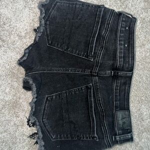 american eagle black jean shorts with crochet detail